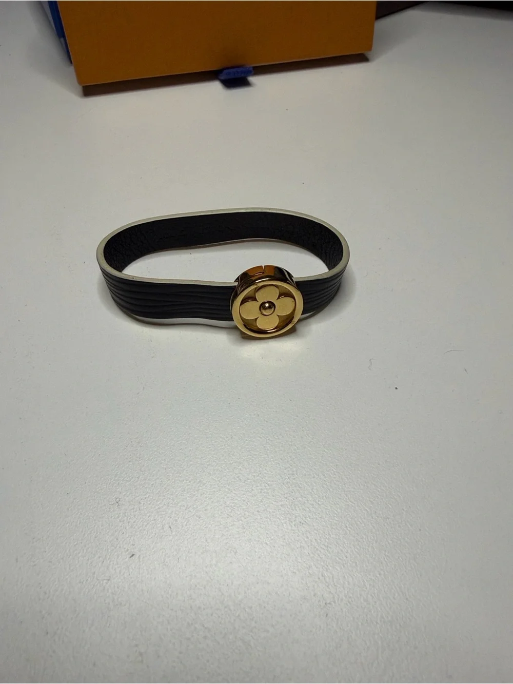 Louis Vuitton Black Leather Bracelet with Gold Flower Medallion